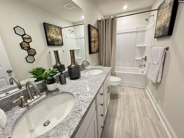 full bathroom with toilet, visible vents, shower / bath combo with shower curtain, and a sink