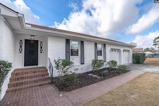 exterior space with a garage