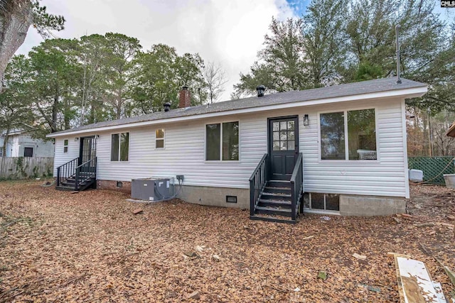 view of front of property with central AC unit