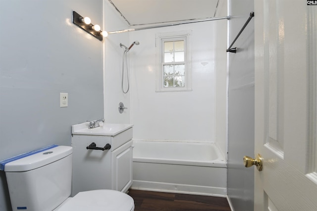 full bathroom with hardwood / wood-style flooring, vanity, toilet, and bathtub / shower combination