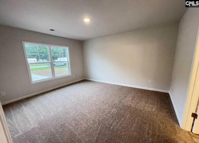 empty room with carpet flooring