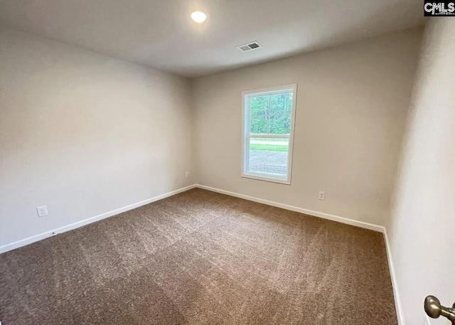 empty room featuring carpet floors