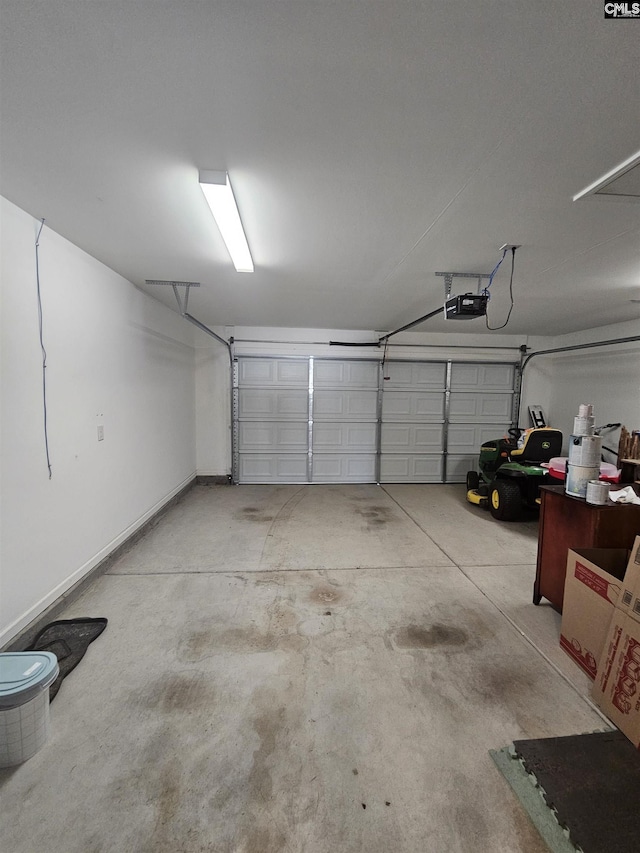 garage featuring a garage door opener