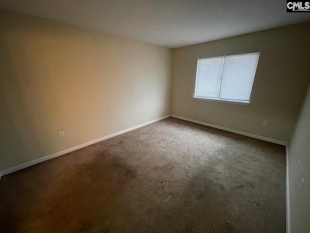 view of carpeted spare room