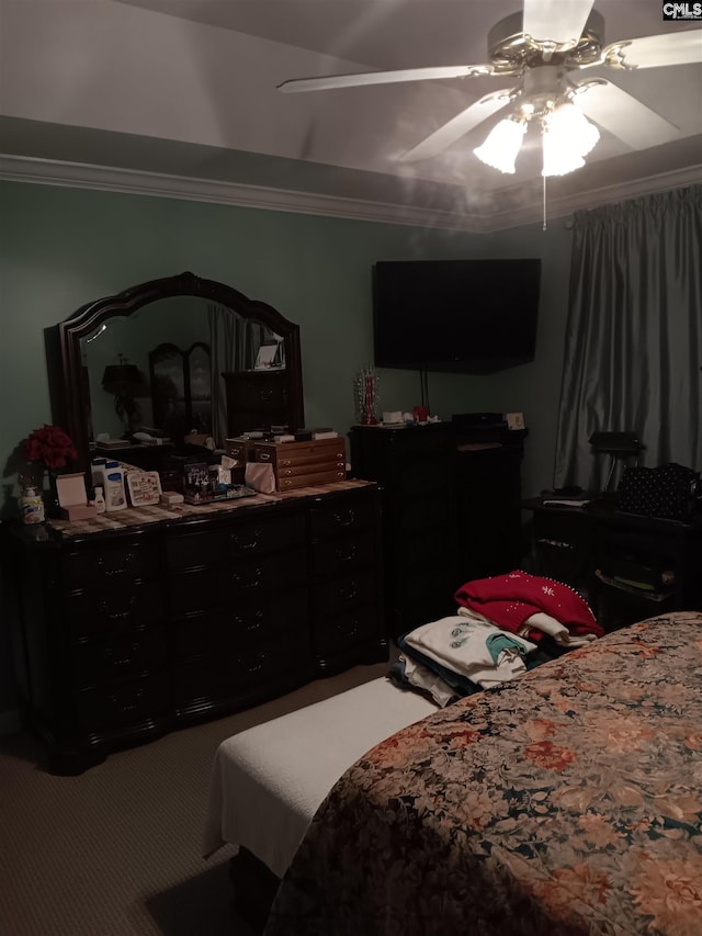 bedroom featuring carpet, ceiling fan, and crown molding