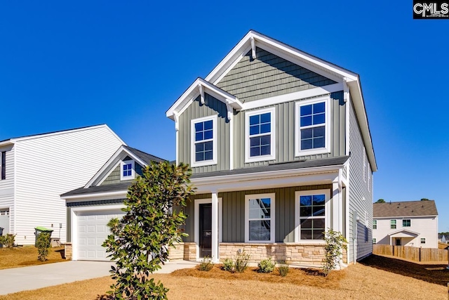 craftsman house with a garage