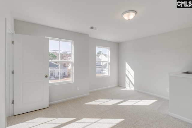 view of carpeted spare room