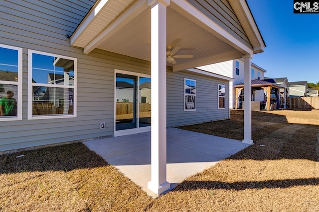 view of patio / terrace with a gazebo and ceiling fan