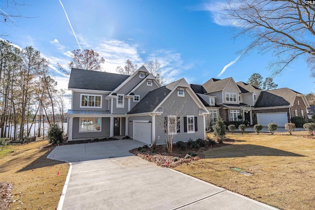 view of front of home featuring a garage and a front lawn