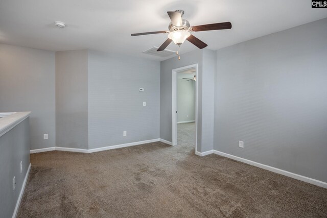 carpeted empty room with ceiling fan