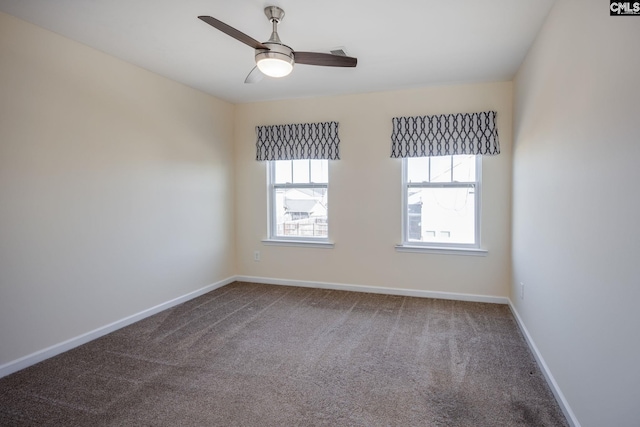 unfurnished room with carpet flooring and ceiling fan