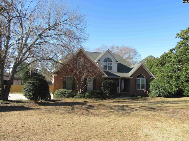 view of property featuring a front yard