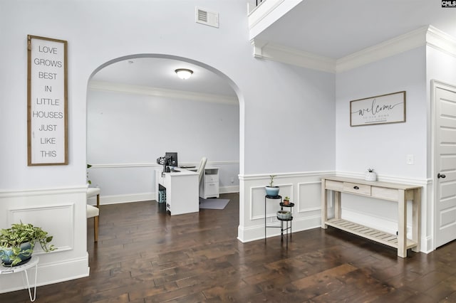 interior space with crown molding and dark wood-type flooring