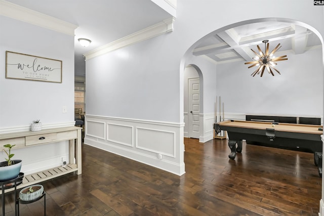 playroom with beamed ceiling, ornamental molding, dark hardwood / wood-style floors, and coffered ceiling