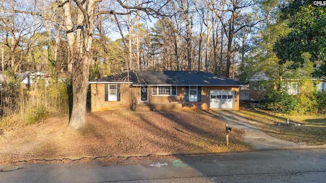 single story home featuring a garage