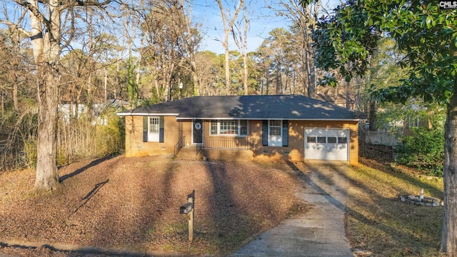 single story home featuring a garage