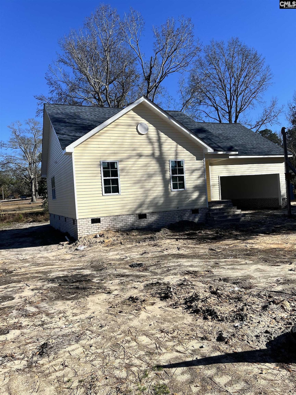 view of home's exterior featuring a garage