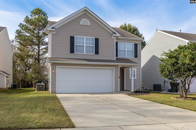 view of front of home with a front yard, central AC, and a garage