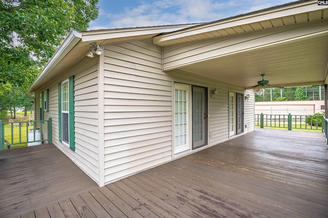 wooden deck with ceiling fan