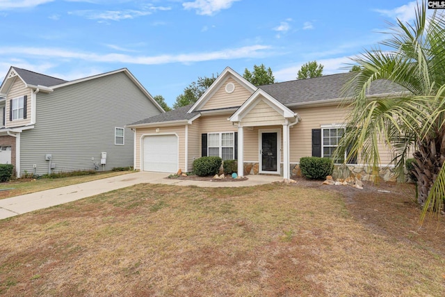 view of front of home featuring a front yard and a garage