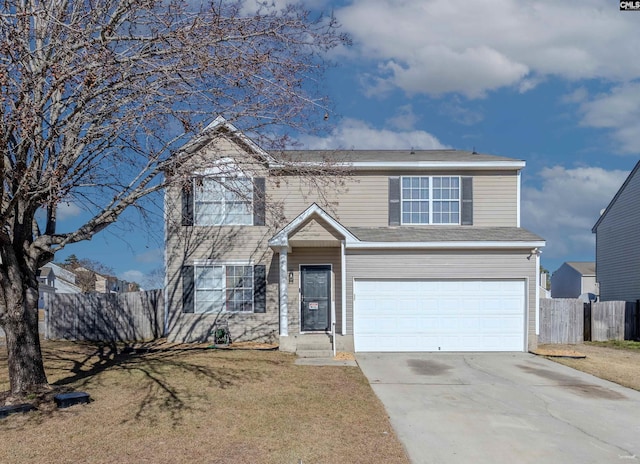 front of property with a front yard and a garage