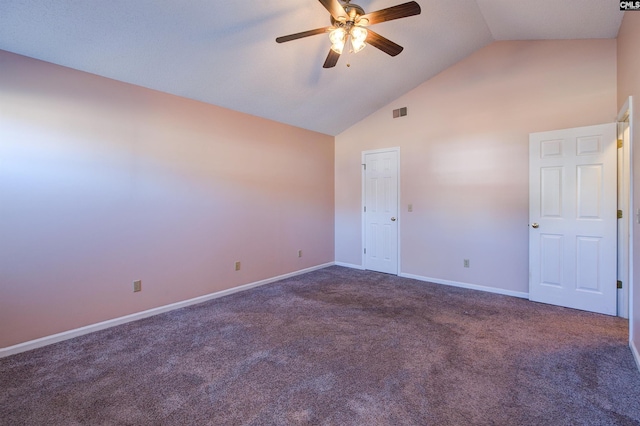 carpeted empty room featuring ceiling fan and high vaulted ceiling