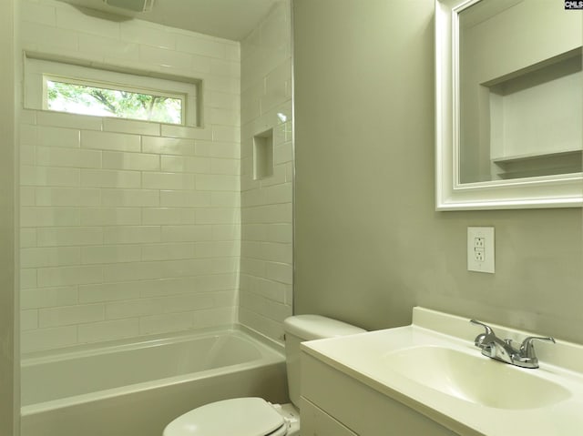 full bathroom with vanity,  shower combination, and toilet