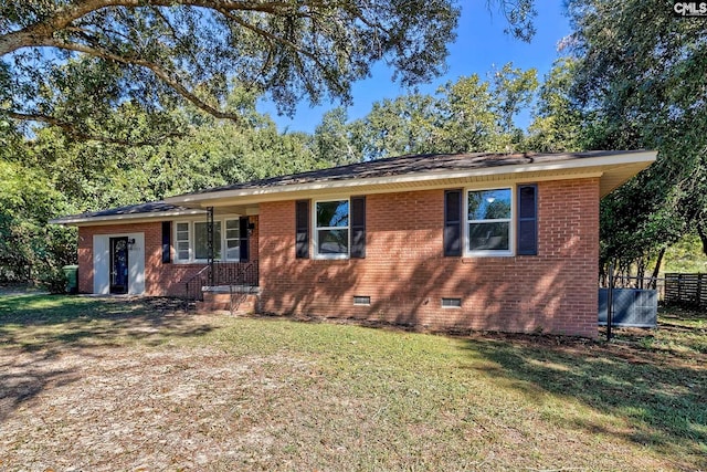 ranch-style home with a front yard