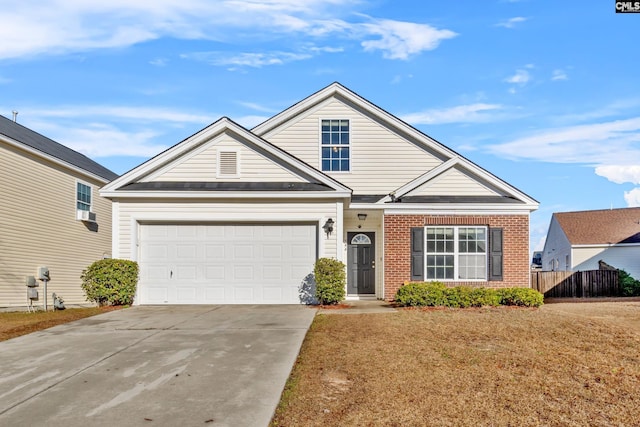 view of front facade featuring a garage and a front lawn