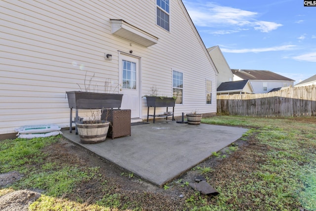 back of property featuring a patio area