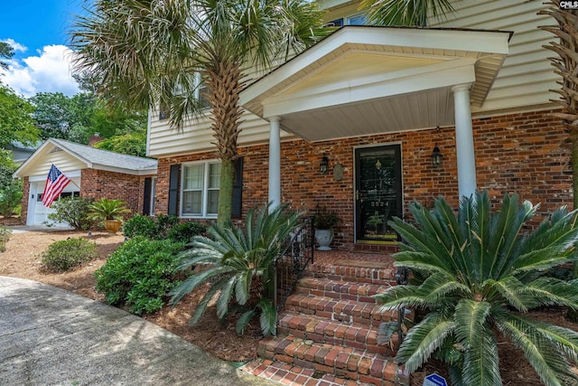 property entrance with a garage