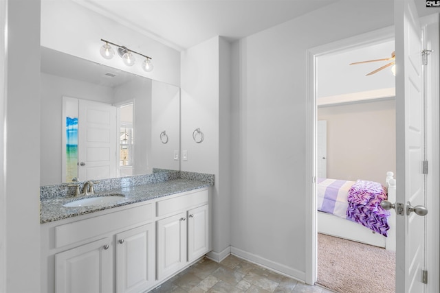 bathroom featuring vanity and ceiling fan