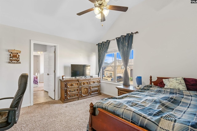 carpeted bedroom featuring vaulted ceiling and ceiling fan