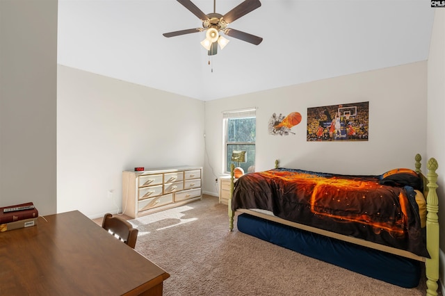 bedroom featuring carpet floors, vaulted ceiling, and ceiling fan