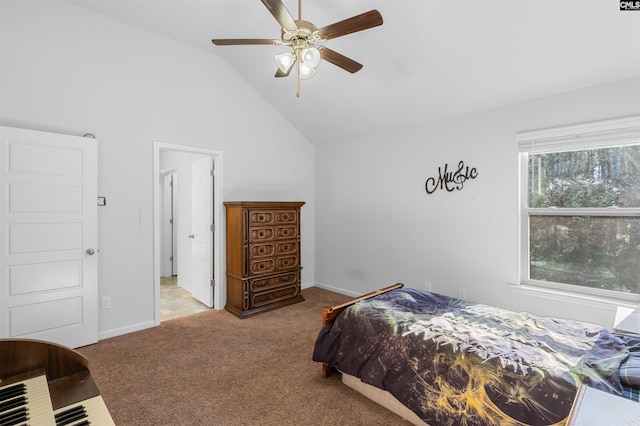 bedroom with ceiling fan, light colored carpet, and lofted ceiling