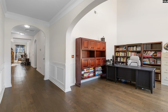 office space with dark hardwood / wood-style floors and ornamental molding