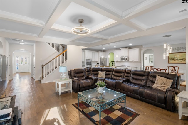 living room featuring crown molding, hardwood / wood-style floors, beamed ceiling, and coffered ceiling