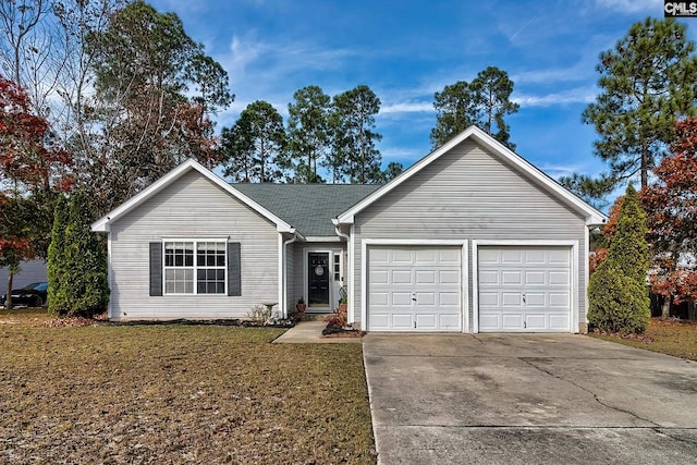 ranch-style home with a garage and a front lawn