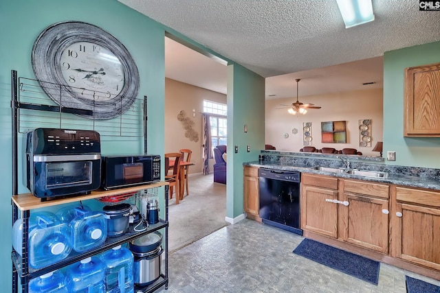 kitchen with a textured ceiling, sink, ceiling fan, and black appliances