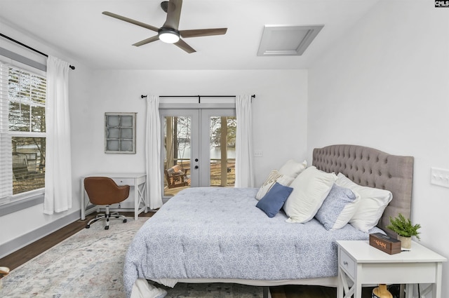 bedroom with ceiling fan, access to exterior, dark wood-type flooring, and french doors