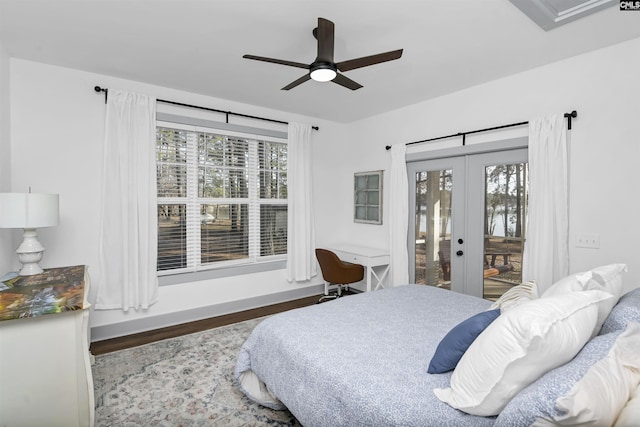 bedroom with hardwood / wood-style flooring, ceiling fan, access to outside, and french doors