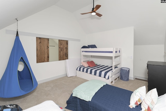 bedroom featuring ceiling fan, light carpet, and lofted ceiling