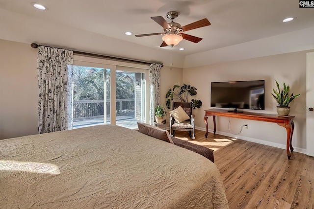 bedroom featuring access to exterior, wood-type flooring, and ceiling fan