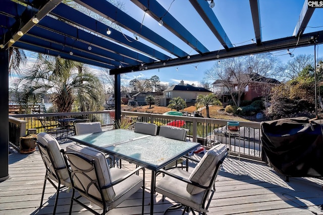 wooden deck featuring a pergola