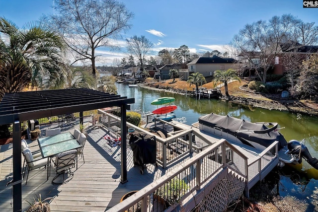 view of dock featuring a gazebo, outdoor lounge area, and a water view