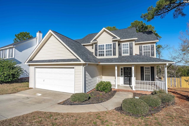 view of front facade featuring a porch and a garage