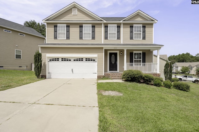 view of front of house with a front yard and a garage