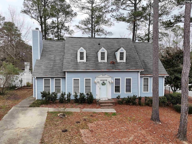 view of new england style home