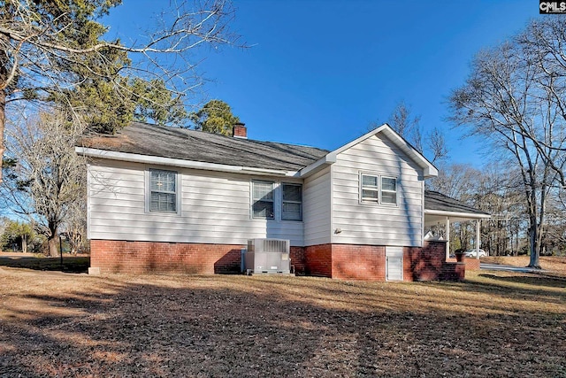 view of front of home featuring cooling unit