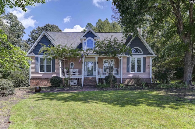 view of front of home featuring a porch and a front yard